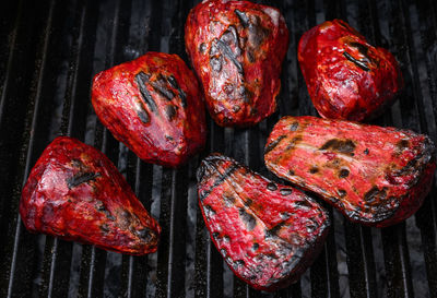 High angle view of meat on barbecue grill