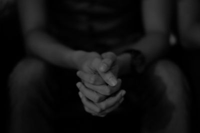 Close-up of couple holding hands