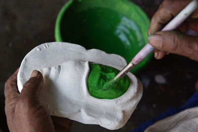 Close-up of hand painting