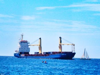 Boats sailing in sea