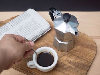 High angle view of coffee cup on table