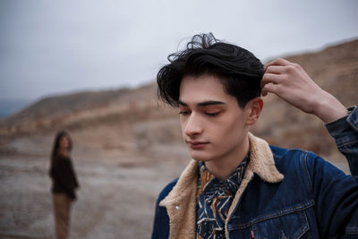 Portrait of young man looking away