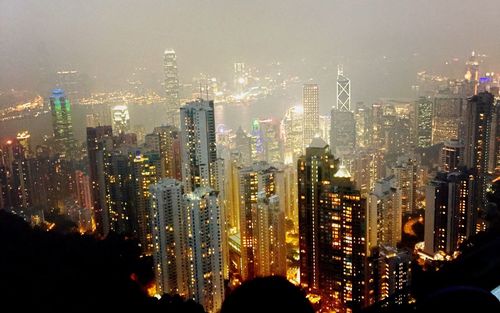 Illuminated cityscape at night