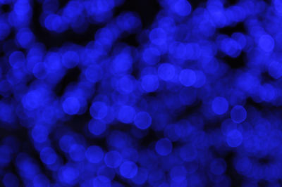 Defocused image of illuminated blue lights