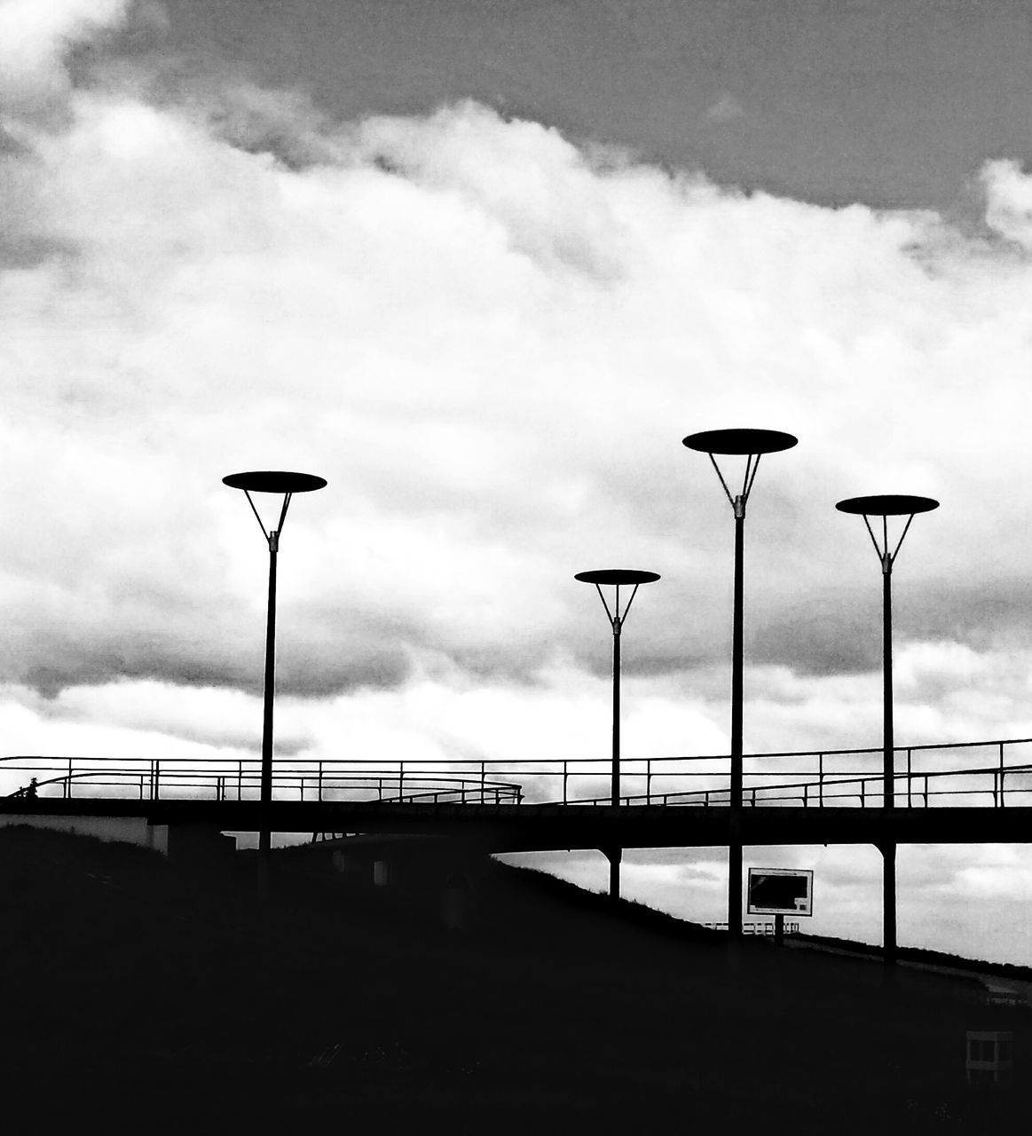 STREET LIGHT AGAINST SKY