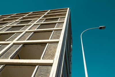 Low angle view of building against blue sky