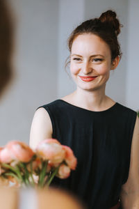 Portrait of a smiling young woman