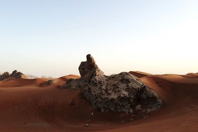 Scenic view of desert against clear sky