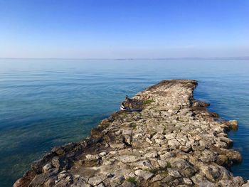 Scenic view of sea against clear sky