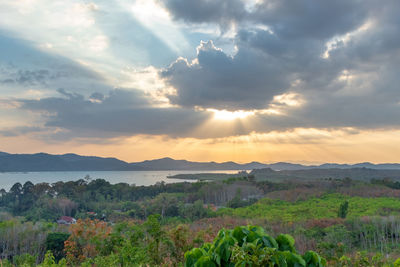 Scenic view of landscape against sky during sunset