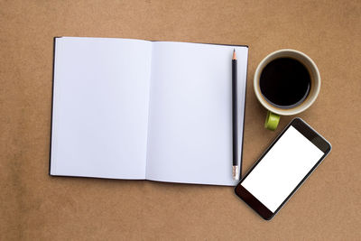 Directly above shot of coffee cup on table