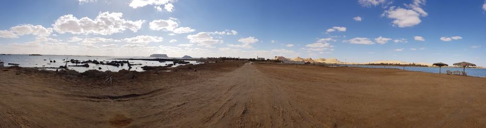 Panoramic view of beach against sky