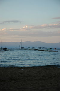 Scenic view of sea at sunset