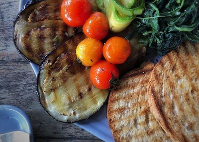 High angle view of fruits in plate on table