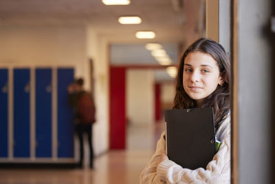 Teenage girl looking at camera