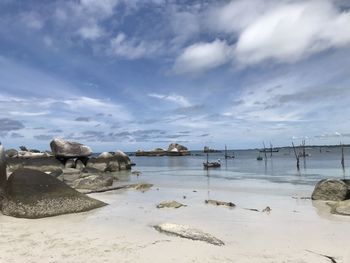 Scenic view of beach against sky