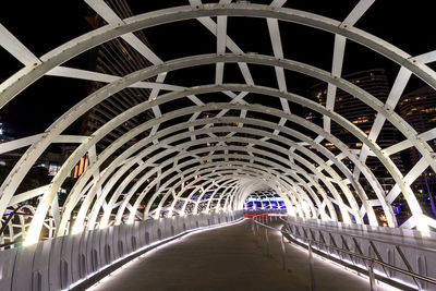 Bridge in illuminated tunnel