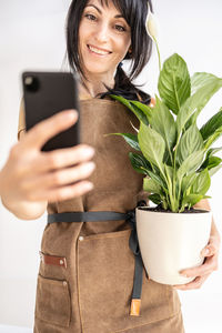 Young woman using mobile phone