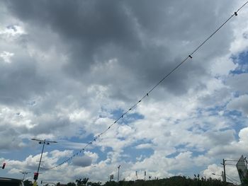 Low angle view of birds against sky