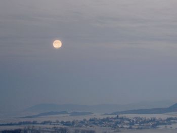 Scenic view of moon against sky at night