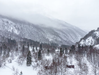 Scenic view of snow covered mountains