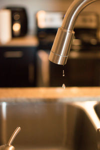 Water dripping from kitchen faucet