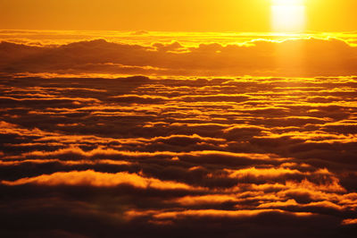 Low angle view of dramatic sky during sunset