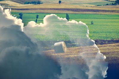 Surreal view of agricultural field through the clouds
