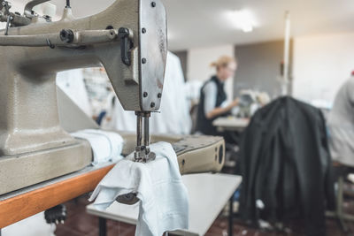 Clothing industry workers working on sewing machines