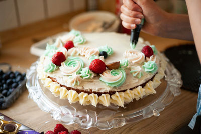 Midsection of cake on table