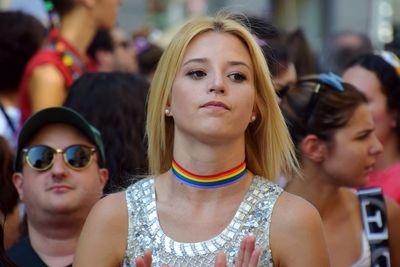 Portrait of young woman in sunglasses