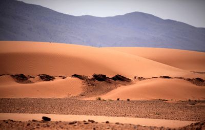 Scenic view of desert against sky