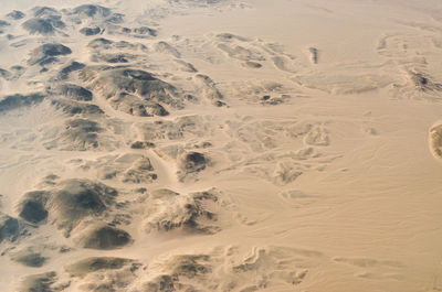 High angle view of sand dunes at beach