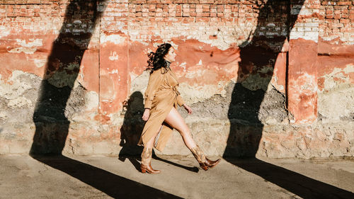 Shadow of woman on wall