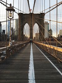 Brooklyn bridge against sky in city