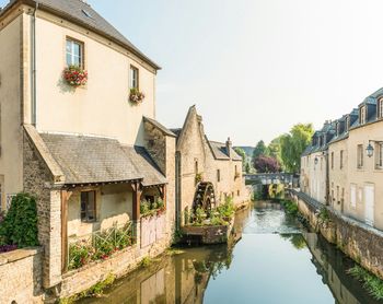 View of canal with buildings in background