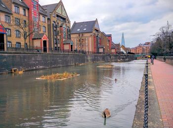 View of canal in city