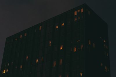 Low angle view of building against sky at night