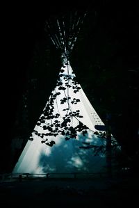 Low angle view of illuminated building against sky