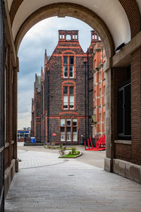 Buildings in city against sky