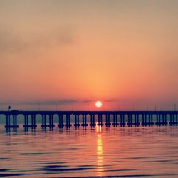 Scenic shot of pier over calm sea