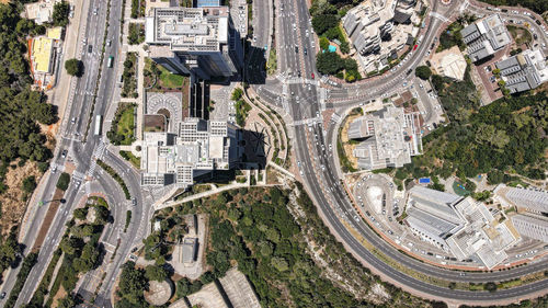 High angle view of road amidst buildings in city