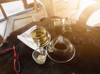 High angle view of glasses on table