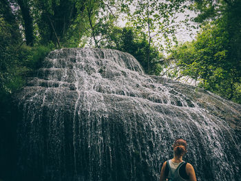 Silhouette of woman in water