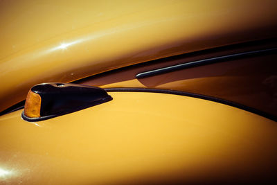 Close-up of yellow car