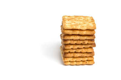 Stack of cookies against white background