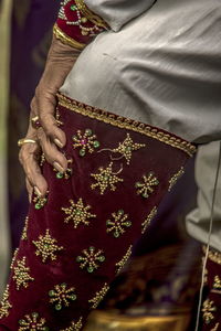 Midsection of woman wearing mask