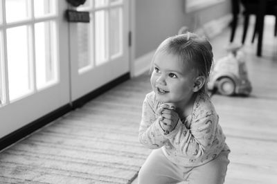 Cute girl sitting at home