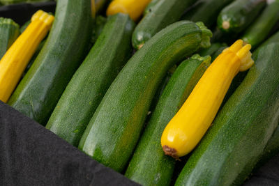 Close-up of green chili peppers at market stall