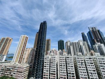 Low angle view of modern buildings against sky